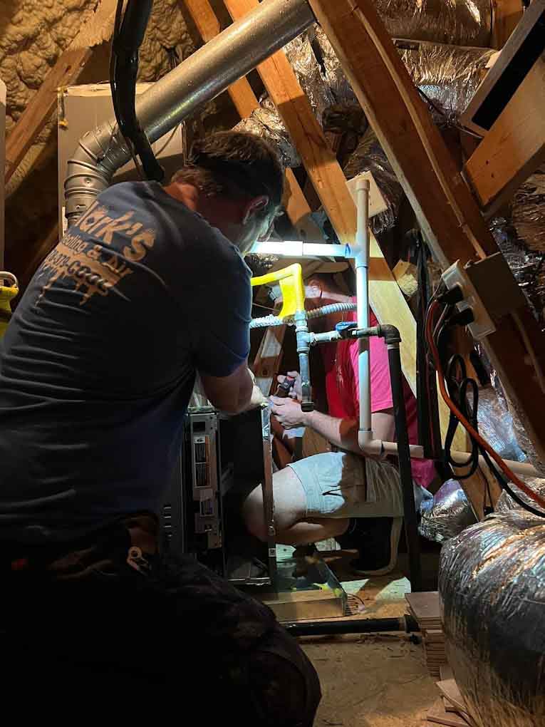 technicians installing a heating system in Braselton, GA